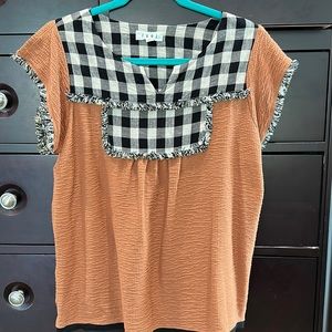 THML burnt orange top with gingham detail.